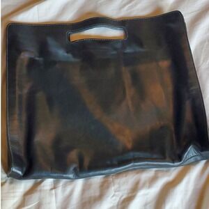 Pour La Victoire Black Leather Oversized Cutout Handle Clutch Bag Clear Trim
